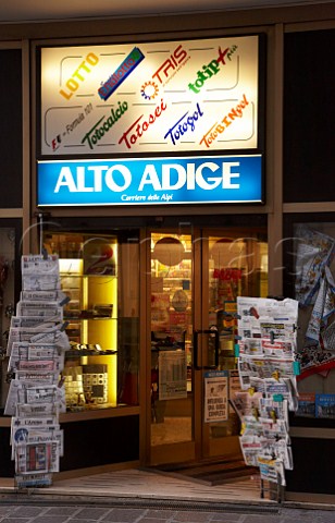 Newspapers on sale outside shop in the historical centre of Bolzano Alto Adige Italy