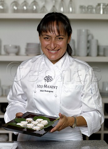 Pilar Rodriguez consultant chef at Viu Manent with a tray of chilenitos Chilean biscuits with manjar  Colchagua Chile
