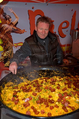 Man selling paella at the the York International Market Place York England