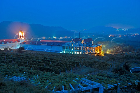 Night lights of Chateau HuadongParry winery with the city of Qingdao in the distance Shandong Province China
