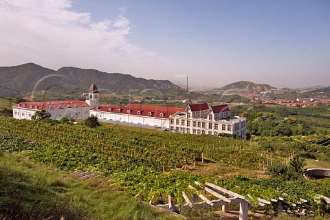 HuadongParry Chateau winery and vineyard with city of Qingdao in the distance Laoshan District Qingdao Shandong Province China