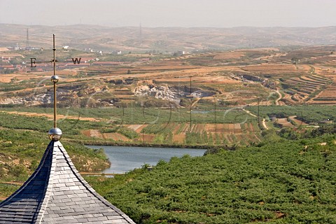 View over vineyards from Treaty Port winery Mulangou Village near Penglai Shandong Province China