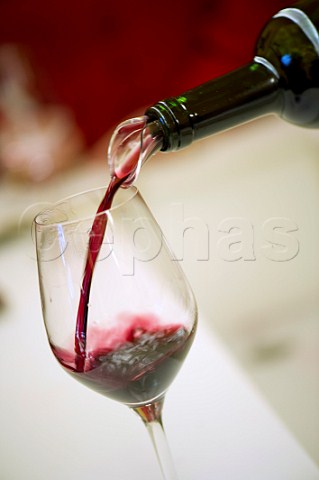Pouring wine at En Primeur tasting of the 2009 vintage  Bordeaux France