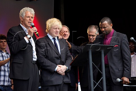 Steve Clifford of the Evangelical Alliance and Jonathan Oloyede of Glory House praying for Boris Johnson Mayor of London at the 2010 London Global Day of Prayer West Ham United Football Club Upton Park London England