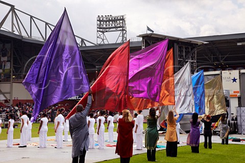 Dancers with flags at the 2010 London Global Day of Prayer   West Ham United Football Club Upton Park London England