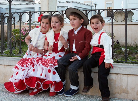 Children in traditional Spanish dress Prado del Rey Sierra de Cdiz Andaluca Spain
