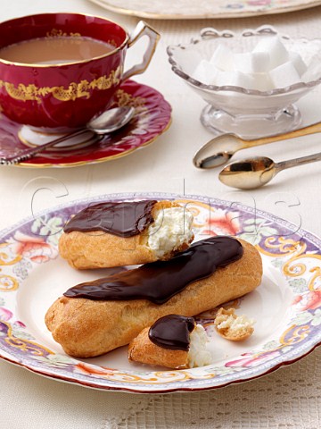 Eclairs in a table setting
