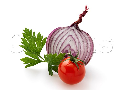 Cherry tomato red onion and parsley on a white background