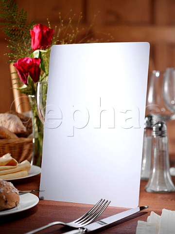 Blank menu in restaurant table setting