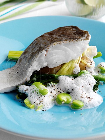 Steamed cod sprouting brocolli new potatoes broad beans leeks and cappuccino sauce