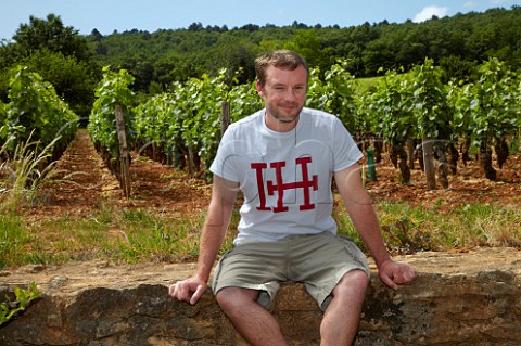 Cyril Audoin and Pinot Noir vines in his Clos de Jeu vineyard Domaine Charles Audoin MarsannaylaCte CtedOr France  Marsannay