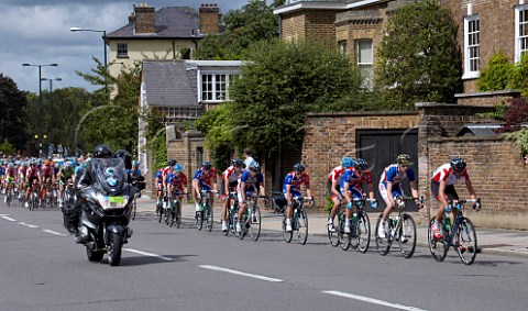 London Surrey Cycle Classic August 2011  The peloton headed by mainly British riders leading Mark Cavendish near Hampton Court on the return journey into London