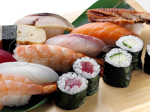 Tuna sushi with rice smoked salmon prawns