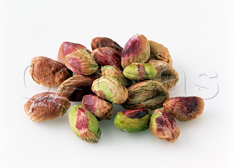 Pistachio nuts on a white background