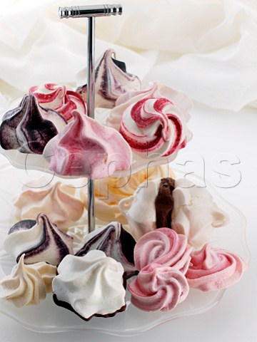 Colourful meringues on a cake stand