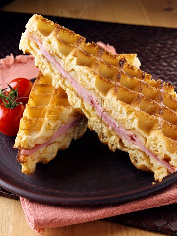 Waffle sandwich with ham and cheese