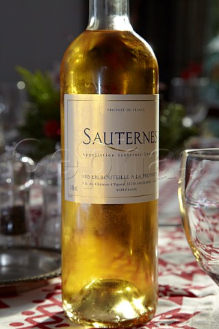 Bottle of Sauternes on a dining table at Christmas France
