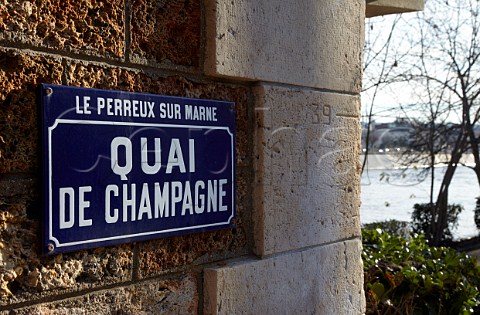 Sign for Quai de Champagne and flood marker by the River Marne in Le PerreuxsurMarne ValdeMarne France