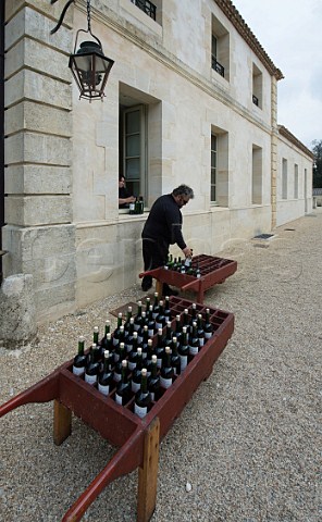 Transporting bottles of wine for the En Primeur tasting of the 2011 vintage at Chteau Montrose  StEstphe France  Bordeaux