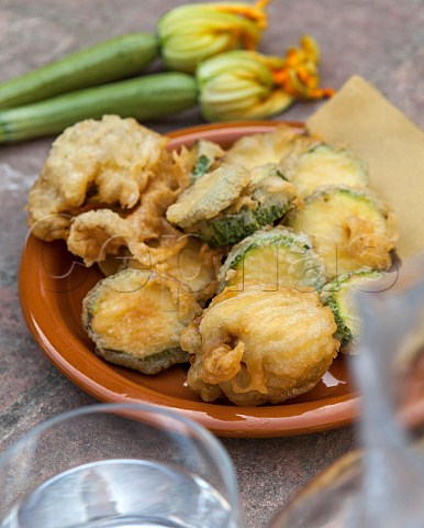 Courgettes and courgette flowers deep fried in batter  Tuscany Italy