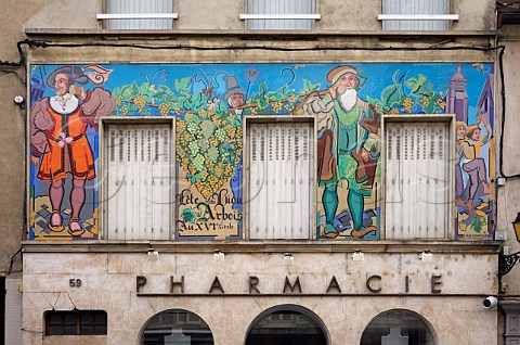 La Fte du Biou ceramic mural on wall of building Arbois Jura France