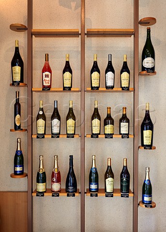 Display of wines in the shop of Fruitire Vinicole dArbois Place de la Libert Arbois Jura France