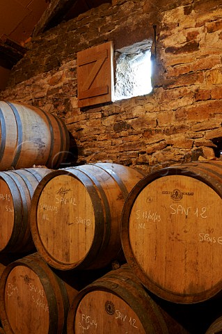 Barrels of Vin Jaune ageing in loft of Domaine Andr et Mireille Tissot MontignylsArsures Jura France  Arbois
