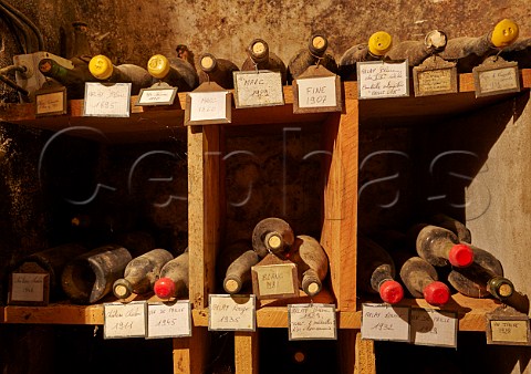 Very old bottles in cellar of Caves Jean Bourdy Arlay Jura France  Ctes du Jura