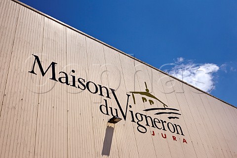 Sign on wall of La Maison du Vigneron owned by Grands Chais de France Cranot Jura France