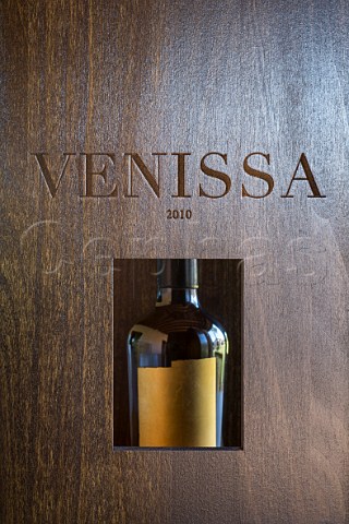 Bottle of Venissa with label of gold leaf in its wooden case Made from Dorona grapes from the Venissa vineyard of Bisol on the island of Mazzorbo Venice Lagoon Veneto Italy