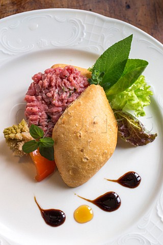 Tartare di Fassone with onion bread Restaurant Bord Torino Piedmont Italy