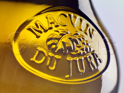 Embossed glass on bottle of Macvin du Jura Jura France