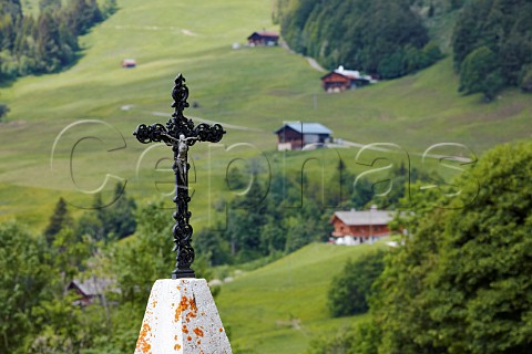Crucifix by mountain path above Le Chinaillon Le Grand Bornand Haute Savoie France
