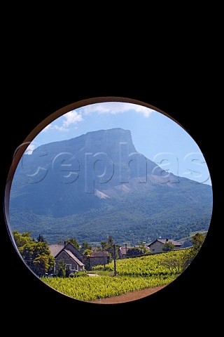 Mont Granier viewed through circular window in the winery of Domaine Philippe et Sylvain Ravier Myans Savoie France   Apremont