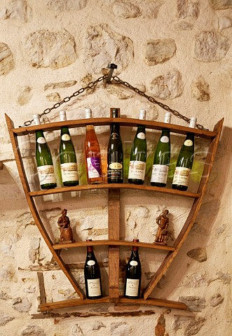 Bottle display in tasting room of Domaine Dupasquier Aimavigne Jongieux Savoie France