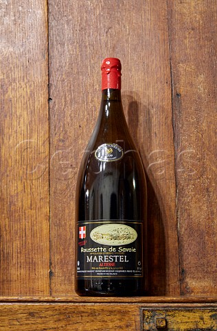 Bottle of Roussette de Savoie cru Marestel on display in tasting room of Domaine Dupasquier Aimavigne Jongieux Savoie France