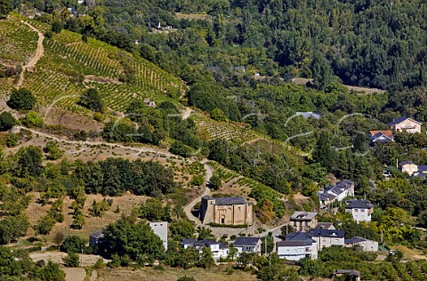 Iglesia de San Miguel de Corulln with vineyards on the hillside above Corulln Castilla y Len Spain  Bierzo