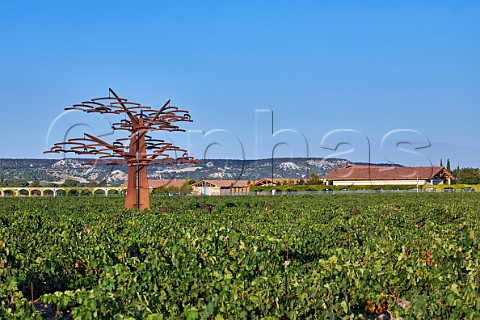 The Tree by Ingo Maurer in vineyard of Vega Sicilia with the old aqueduct and bodegas beyond Valbuena de Duero Castilla y Len Spain  Ribera del Duero