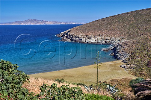 Pachia Ammos Beach near Agios Ioannis Porto with Mykonos in the distance Tinos Greece
