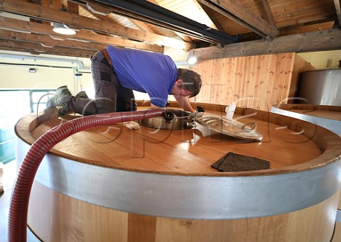 Roberto Conterno pumpingover Nebbiolo must during fermentation in winery of NerviConterno Gattinara Piedmont Italy