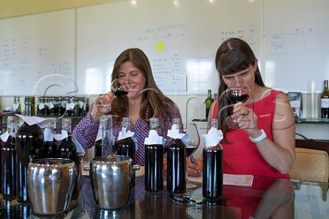 Andrea Leon right with her assistant Paula Muoz tasting 2020 Merlot in the laboratory of Lapostolle Colchagua Valley Chile