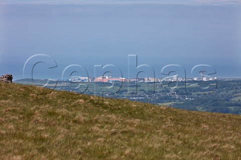 Sellafield nuclear site and village of Gosforth viewed from Irton Fell  Cumbria England
