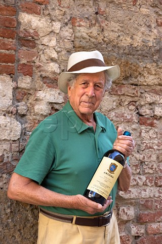 Orlandini Pierfranco winemaker with bottle of Argena  Tenuta il Santo Trequanda Tuscany Italy