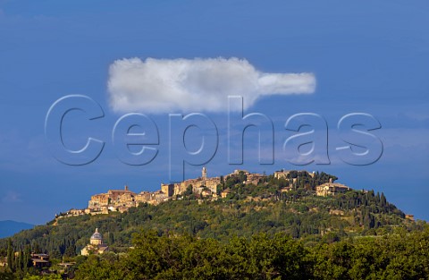 The wine town of Montepulciano with a bottleshaped cloud over it Tuscany Italy  Vino Nobile di Montepulciano