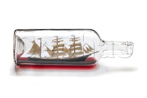 Ship in a bottle with red wine