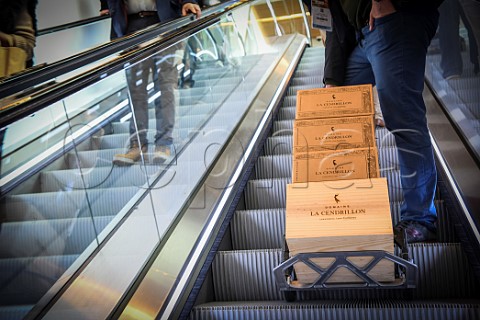 Cases of Domaine La Cendrillon wine on the escalator at Vinexpo Paris 2022 Expo Porte de Versailles Paris France