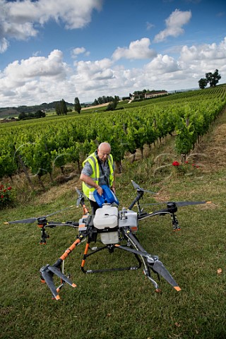 Preparing a drone to spray vineyard of Chteau Mangot StEtiennedeLisse Gironde France  Stmilion  Bordeaux