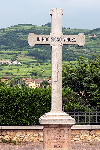 Cross outside the church of Santa Madonna della Bassanella bearing the words In Hoc Signo Vinces meaning in this sign you will conquer The term dates back to the armies of ancient Roman times Soave Veneto Italy Soave Classico