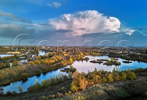 View east over the former Lambeth Reservoir of Molesey Reservoirs Nature Reserve with the River Thames beyond West Molesey Surrey England