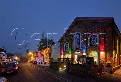 Esher Green Baptist Church and Christmas lights on houses  Park Road Esher Surrey England